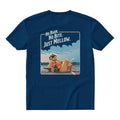 Blue t-shirt with a graphic of a dog by a lake and text 'No Bark. No Bite. Just Mellow.'