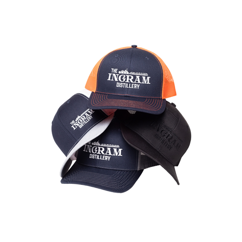 Three caps with 'Ingram Distillery' branding on a white background